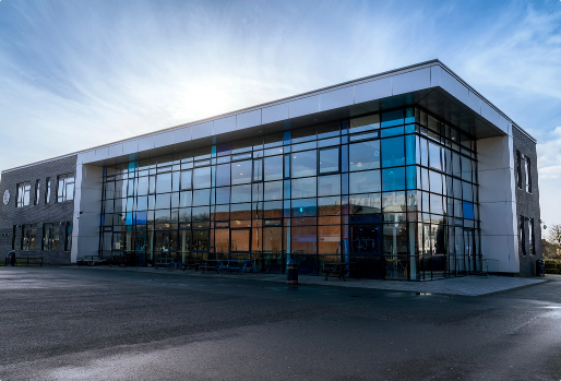 Glass office building in the sun